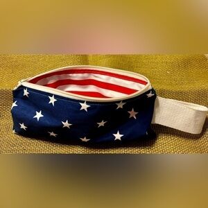 Hand crafted zippered pouch in a variety of patterns with fun bold linings